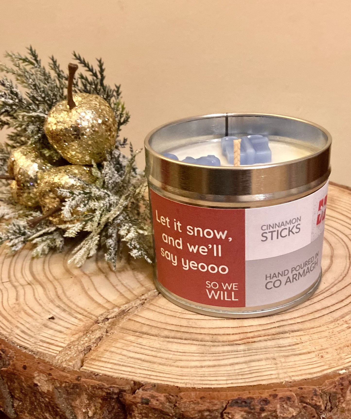 Large candle tin 'Let it snow and we'll say yeoo so we will' 190g Cinnamon Sticks